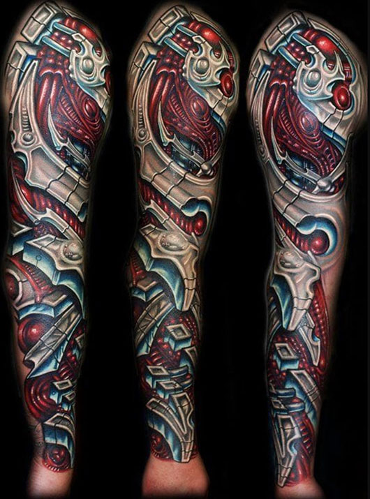 Man full arm biomechanical tattoo sleeve